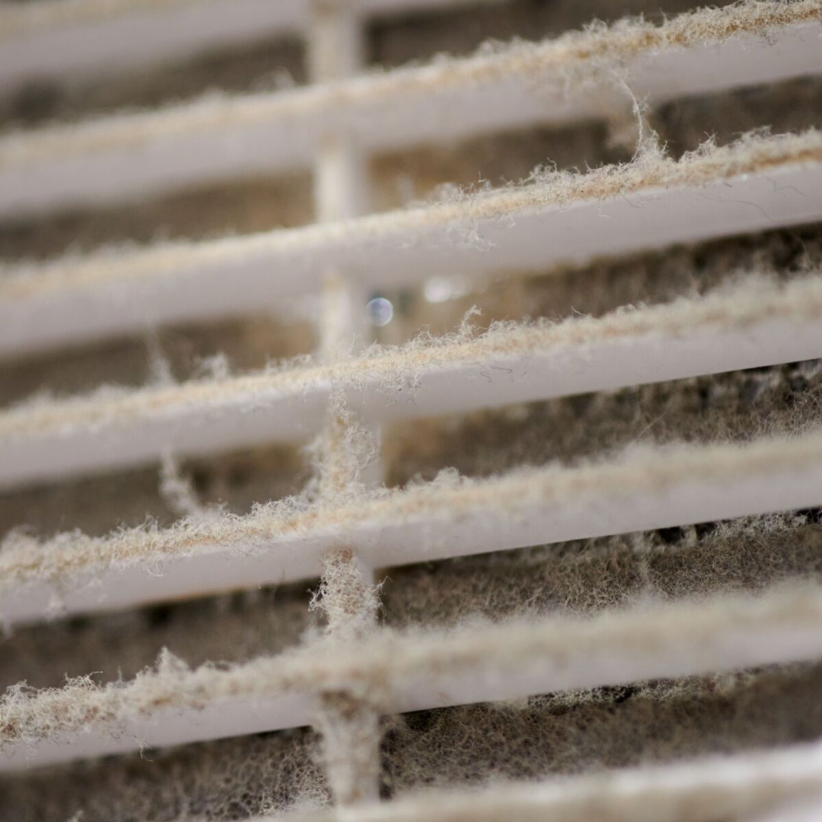 dirty-air-vent Dusty air vent in a home in need of indoor air quality control services.